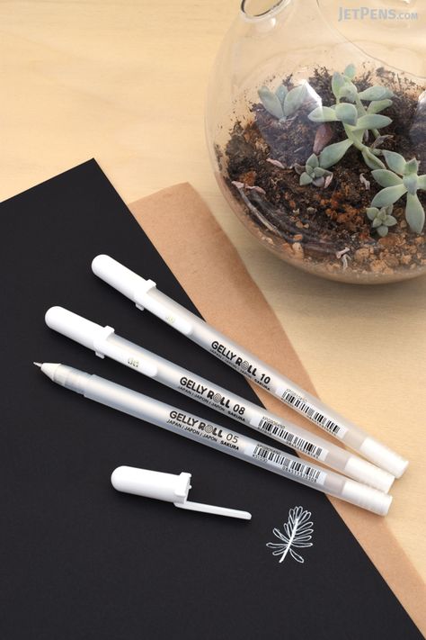 The classic Sakura White Gelly Roll Gel Pen now comes in additional tip sizes! White Ink Pen, White Gel Pen On Black Paper, Journals Pens & Pencils, Journal Pens & Pencils, Kawaii School Supplies Pens & Pencils, Pretty School Supplies, Stationery Obsession, Art Painting Supplies, White Paint Pen