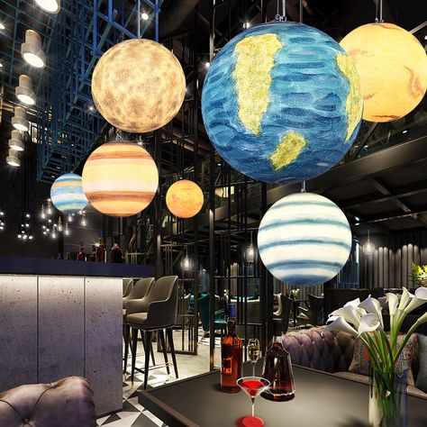 This pendant lamp has a unique design of the universe planet, you can purchase it from Homelava.com to decorate your kids room or restaurant. Space Themed Restaurant Interior Design, Conference Installation, Planet Lights, Planet Decorations, Planet Room, Kindergarten Playground, Restaurant Bar Counter, Sky Restaurant, Hanging Lamps Living Room