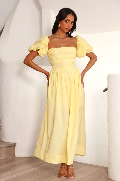 She's perfect, girl! The Birthday Picnic Maxi Dress features gorgeous puff sleeves and a flowy skirt. Style with heels and curls for a 'fit you'll get compliments on. #hellomolly Maxi Dress Birthday Outfit, Yellow Picnic Outfit, Pastel Yellow Bridesmaid Dress, Sunset Bridesmaids, Midi Yellow Dress, Proposal Dress, Summer Yellow Dress, Yellow Flowy Dress, Pale Yellow Dress