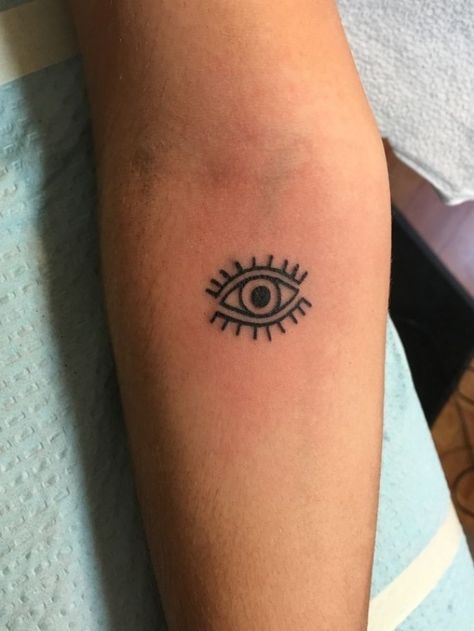 evil eye tattoo | Tattoos, Cute tiny tattoos, Small wrist ... #wristtattoos #tattooideas Evil Eye Tattoo Realistic, Evil Eye Arm Tattoo, Evil Eye Tattoo Men, Tattoo Of An Eye, Small Eye Tattoo, Eye Tattoo On Arm, Eye Tattoo Meaning, Third Eye Tattoos, Small Wave Tattoo