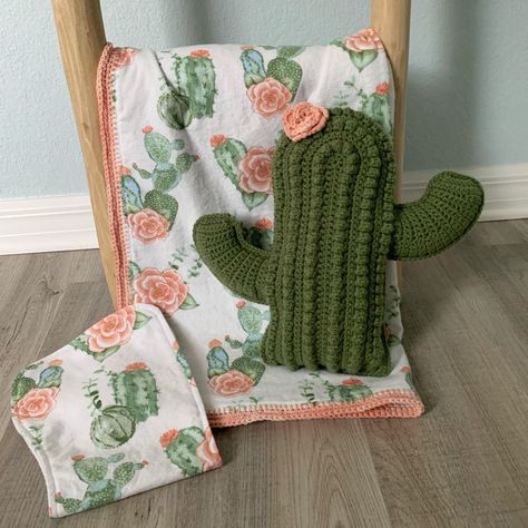 "Cactus baby gift set made with a lightweight cotton flannel featuring peach floral cactus print on one side and heart print on reverse, with a crochet border. This cactus set is super cute, easy to care for, and functional for daily use; making it a perfect gift for a little loved one in your life. Set includes: Generously sized blanket measuring 42\"x40\", baby will be able to use this blanket right into toddlerhood. Blanket is large enough for the crib, tummy time, swaddling, and carseat cove Western Kids Rooms, Cactus Plushie, Peach Nursery, Plushie Gift, Contoured Burp Cloth, Cow Nursery, Cactus Rose, Rose Nursery, Crochet Border