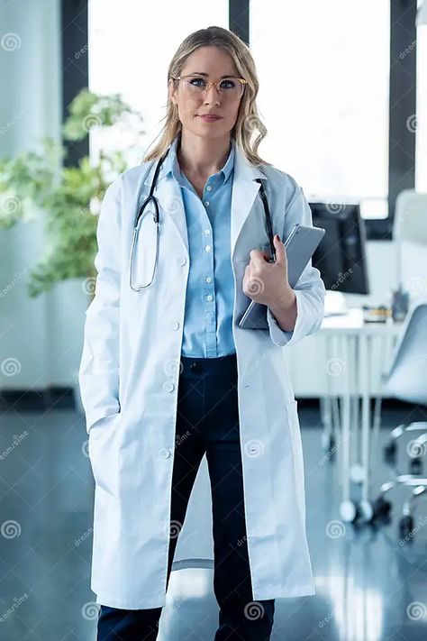 Attractive Mature Female Doctor Looking at Camera while Holding Digital Tablet Standing in the Consultation Stock Photo - Image of digital, diagnosis: 210786282 Female Doctor Aesthetic, Pretty Doctor, Doctor Friends, Doctor Female, Female Doctors, Tiktok Inspiration, Doctor Coat, Medical Photography, Surgeon Doctor