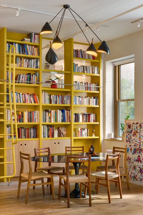 Photo 4 of 15 in A Yellow Floor-to-Ceiling Library Wall Brightens Up This SoHo Loft - Dwell Ceiling Library, Yellow Bookshelves, Modern Home Library, Yellow Floor, Bookshelf Inspiration, Soho Loft, Library Wall, Prefab Homes, Home Library