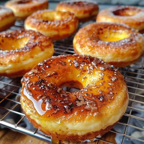 🍩✨ Indulge in the ultimate breakfast delight with Heavenly Crème Brûlée Donuts! #CremeBruleeDonuts #GourmetDonuts 🍽️ Heavenly Crème Brûlée Donuts 🛒 Ingredients: 500 grams all-purpose flour 10 grams instant yeast 50 grams sugar 5 grams salt 250 ml warm milk 2 large eggs (about 100 grams) 50 grams unsalted butter, softened 200 grams vanilla pastry cream 100 grams granulated sugar (for caramelizing) 👩‍🍳 Instructions: Dough Preparation: Mix flour, yeast, sugar, and salt. Add warm milk and egg... Cream Donut Recipe, Donut Sprinkle, Vanilla Pastry Cream, Fried Donuts, Instagram Recipes, Cookie Bakery, Ultimate Breakfast, Twisted Recipes, Pastry Cream