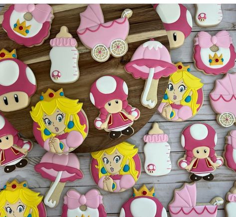 Princess Peach Cakesicles, Princess Peach Baby Shower Ideas, Princess Peach Treats, Princess Peach Sugar Cookies, Princess Peach Cookies Decorated, Princess Peach Cookies, Peach Baby Shower Cookies, Princess Peaches, Princess Peach Birthday