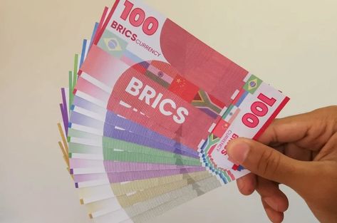 '55 BRICS currency = $1': American TikTokers claim the potential BRICS currency could mean 'the end of the US dollar'. Brics Countries, Money System, Gold Stock, Investment Advice, Online Trading, Financial Markets, Crypto Currencies, Us Dollars, Financial Institutions