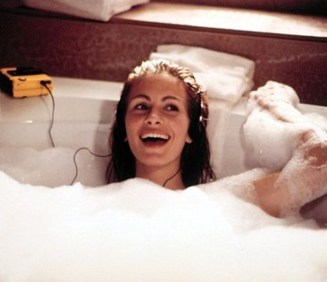 A bath fit for a queen. | 10 Most Iconic Movie Scenes Ever To Take Place In The Bathroom In The Bathtub, Pretty Woman, Headphones, A Woman, Water, Hair