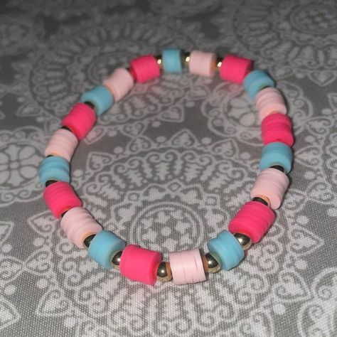 Homemade Clay Bead Bracelet. Hot Pink, Soft Pink, And Baby Blue. (Any Questions Comments Or Concerns Please Message Me) Pink Blue Bracelet, Bracelet Patterns Clay Beads, Pink Clay Bead Bracelet, Beaded Tutorials, Make Clay Beads, Clay Bead Bracelets, Clay Bracelets, Gold Stretch Bracelet, Homemade Clay