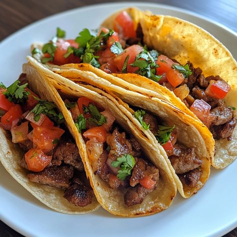 ### 🌮 ¡Deliciosos Tacos Mexicanos! 🇲🇽 **Ingredientes:** - 500 g de carne de res, cerdo o pollo, picada - 8 tortillas de maíz - 1 cebolla, picada - 1 tomate, picado - 1 aguacate, en rodajas - Cilantro fresco, al gusto - Limón, al gusto - Sal y pimienta al gusto - Salsa (de tu elección) **Instrucciones:** 1. En una sartén, cocina la carne a fuego medio hasta que esté dorada. Agrega sal y pimienta al gusto. 2. Calienta las tortillas en un comal o sartén durante unos segundos por cada lado. 3... Tacos Mexicanos, Minced Beef, Mexican Tacos, Mexican Cooking, Carne Asada, Corn Tortillas, Fresh Cilantro, Cooking Meat, Tortillas