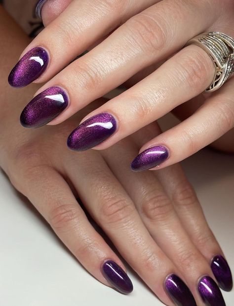 Deep Purple Sparkle Nails, Dark Purple Cateye Nails, Purple Shine Nails, Purple Halloween Nails Almond, Pink And Black Cat Eye Nails, Cateye Purple Nails, Green And Purple Cat Eye Nails, Violet Aura Nails, Purple Cat Eye Nails Design