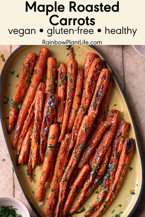 Roasted carrots are coated in a buttery and sweet maple-butter glaze, then finished in the oven until perfectly browned, caramelized, and sticky. Vegan Maple Roasted Carrots, Glazed Carrots For Thanksgiving, Thanksgiving Carrot Recipes Vegan, Vegan Glazed Carrots, Vegan Roasted Carrots, Maple Glazed Roasted Carrots, Carmelized Carrots, Best Roasted Carrots, Maple Dijon Roasted Carrots