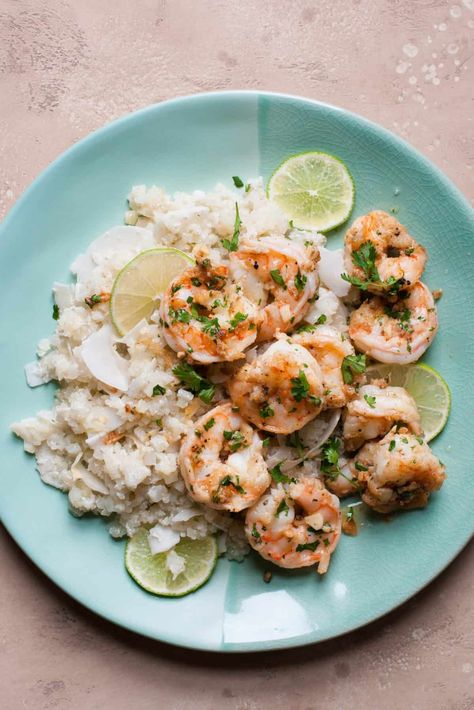 For a complete and filling meal, Cilantro Lime Shrimp with Coconut Cauliflower Rice is the perfect option. It's a tangy, zesty dish made of deliciously flavorful ingredients perfect for enjoying any night of the week! Cilantro Lime Rice And Shrimp, Cilantro Lime Shrimp And Cauliflower Rice, Rice And Shrimp, Coconut Cauliflower Rice, Coconut Cauliflower, Cilantro Lime Shrimp, Lime Shrimp, Lime Rice, Cilantro Lime Rice