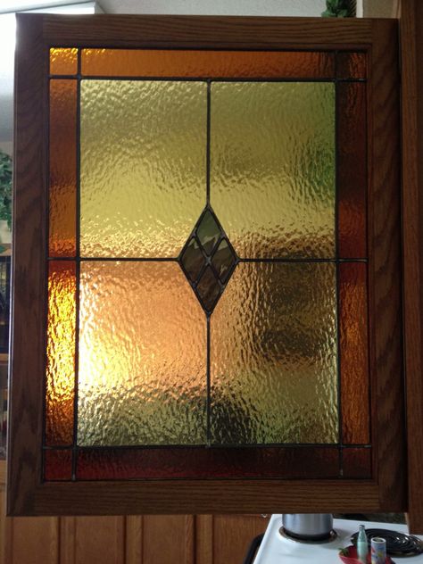 Stained glass Kitchen cabinet door opened to appreciate Covering Glass Stained Cabinet Doors, Smoked Glass Kitchen Cabinet Doors, Stained Glass Cabinet Doors, Stained Glass Cupboard Doors, Stained Glass Kitchen Cabinet Doors, Glass Kitchen Cabinet, Brown Stained Glass Window, Glass Kitchen Cabinet Doors, Kitchen Cabinet Door