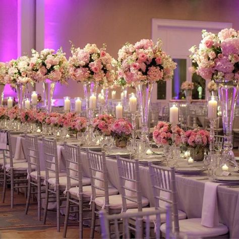 16 Tall and Dramatic Wedding Centerpieces | PreOwned Wedding Dresses Wedding Reception Centerpieces Candles, Long Table Wedding, Flowers And Candles, Pink Centerpieces, Feminine Wedding, Wedding Reception Centerpieces, Reception Centerpieces, Tall Centerpieces, Long Table