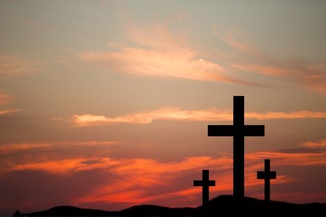 Three wooden crosses in silhouette stand silently on a hill at Wooden Cross Tattoos, Good Friday Images, Background Tattoo, Cross Background, Christian Photography, Three Crosses, Worship Backgrounds, Church Backgrounds, Cross Pictures