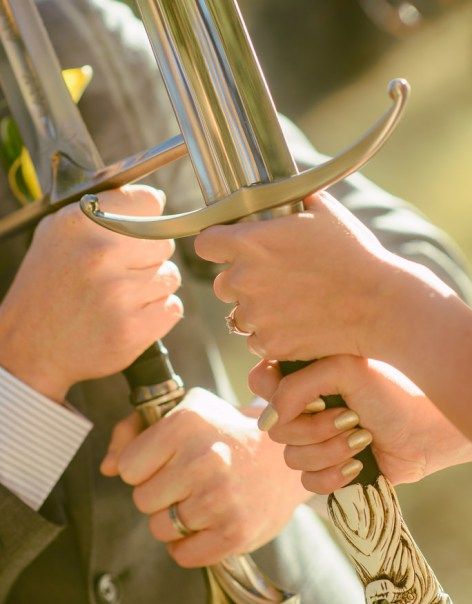 Epic sword battle as seen on @offbeatbride #weddings #swords Game Of Thrones Wedding, Hobbit Wedding, Midsummer Nights Dream Wedding, Peter Pevensie, Dragon Cake, Viking Wedding, Epic Wedding, Medieval Wedding, Red Details