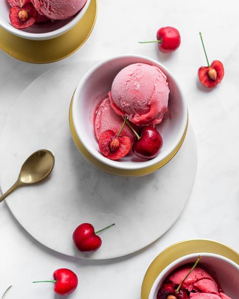 This icy cherry sorbet is spiked vanilla bean, almond, and kirsch which gives a potent, vibrant cherry flavor. A good dose of honey provides sweetness to balance the cherries for a delicious, simple summertime dessert. Cherry Ice Cream Recipe, Cherry Sorbet, Sorbet Is, Cherry Ice Cream, Frozen Yoghurt, Blueberry Recipes, Cherry Juice, Cherry Flavor, Sweet Cherries