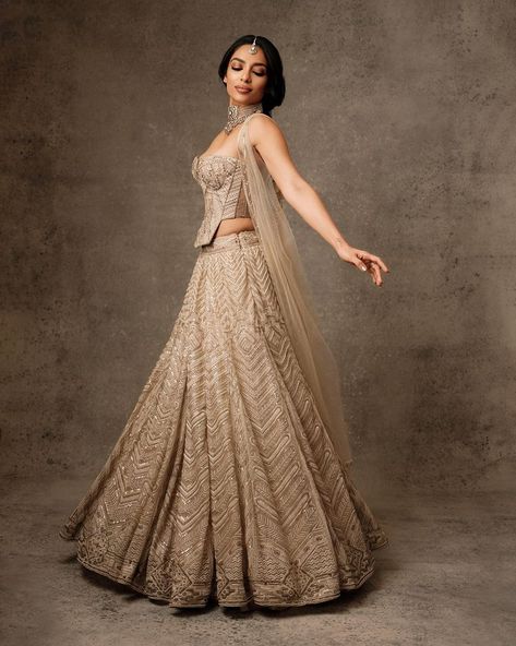 Tarun Tahiliani | �𝗦𝗼𝗯𝗵𝗶𝘁𝗮 𝗗𝗵𝘂𝗹𝗶𝗽𝗮𝗹𝗮 𝗶𝗻 𝗧𝗮𝗿𝘂𝗻 𝗧𝗮𝗵𝗶𝗹𝗶𝗮𝗻𝗶 Sobhita (@sobhitad) wears our Art Deco inspired embroidered corset and lehenga for the wedding… | Instagram Corset Lehenga, Sobhita Dhulipala, Radhika Merchant, Anant Ambani, Tamil Serial, Embroidered Corset, Wedding Festivities, Tarun Tahiliani, Chaniya Choli