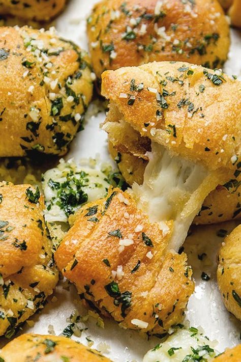 15 Unexpected Recipes You Can Make with Crescent Roll Dough #purewow #recipe #food #cooking #baking Crescent Sheet Recipes, Crescent Roll Bread, Cheesy Garlic Knots, Crescent Dough Sheet Recipes, Crescent Roll Recipes Appetizers, Crescent Roll Dough Recipes, Bread Knots, Crescent Dough Recipes, Pillsbury Crescent Recipes