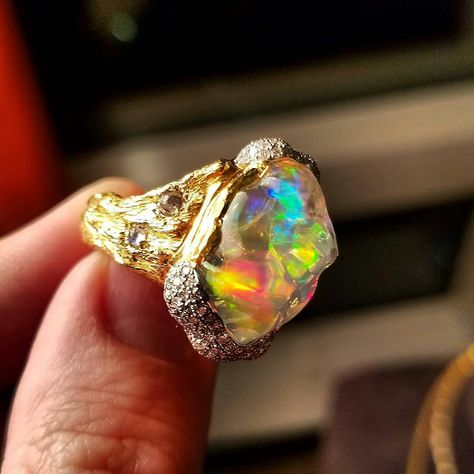 This Opalicious ring has a Fiery inside with a Glacier like, smooth surface. A Mexican JellyOpal. StatementRing from @victorvelyan. This Gemmy Tumbled Pebble is One-of-a-kind! @cayencollection Opal Bracelet Gold, Opal Statement Ring, Rough Stone Ring, Crystal Opal, Fancy Jewellery, Opal Bracelet, Fantasy Jewelry, Opal Crystal, Gorgeous Jewelry