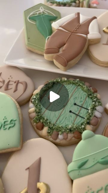 sara bogart on Instagram: "my precious 💚✨ wishing Caden all the magic for his lord of the rings inspired 1st birthday!   some cookie inspo/designs from: @kassyscookies @mixingbowlcookiecompany   #lordoftherings #decoratedcookies #royalicing" Hobbit Cookies Decorated, Hobbit Door Cookies, One Birthday To Rule Them All, Lord Of The Rings Cookies, Lord Of The Rings Food Ideas, Lord Of The Rings Decorations, Hobbit Cookies, Lord Of The Rings First Birthday, Tolkien Party