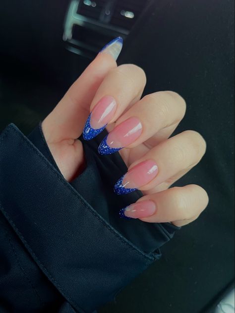 Cute Nails With Blue Dress, Royal Blue Nails With Sparkles, Nails For Blue Sparkly Dress, Navy And Sparkle Nails, Dark Blue With Sparkles Nails, Blue Glitter Nails French Tip, Sparkle Navy Blue Nails, Almond Royal Blue French Tip Nails, Navy Blue And Silver Nails French Tips