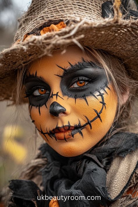 17 Classic Halloween Makeup Looks You Can Easily Recreate Painted Face Halloween Women, Scary Jack O Lantern Makeup, Spooky Face Makeup, Scary Scarecrow Face Paint, Zombie Scarecrow Makeup, Clown Face Ideas, Halloween Face Painting For Women, Spooky Scarecrow Makeup, Spooky Makeup Looks Halloween