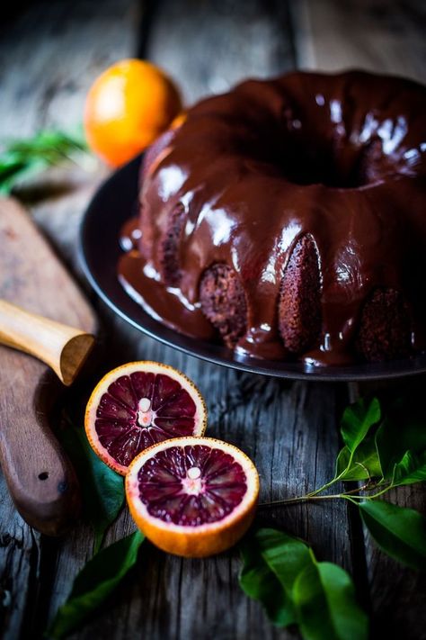 Dark Chocolate Bundt Cake with Blood Oranges and a Chocolate Ganache icing. Simple, moist, flavorful and absolutely scrumptious!  Hi friends, this is one of the most delicious chocolate cakes I've ever had. Truly. However the story that follows is quite sad, so I caution you now, to skip to the recipe if you don't have it in you.  I totally understand. I made this decadent Dark Chocolate Blood Orange Bundt Cake last Saturday, not knowing then how much I would end up needing i Dark Chocolate Bundt Cake, Blood Orange Recipes, Chocolate Ganache Icing, Feasting At Home, Orange Bundt Cake, Ganache Icing, Best Cake Ever, Chocolate Bundt, Chocolate Bundt Cake