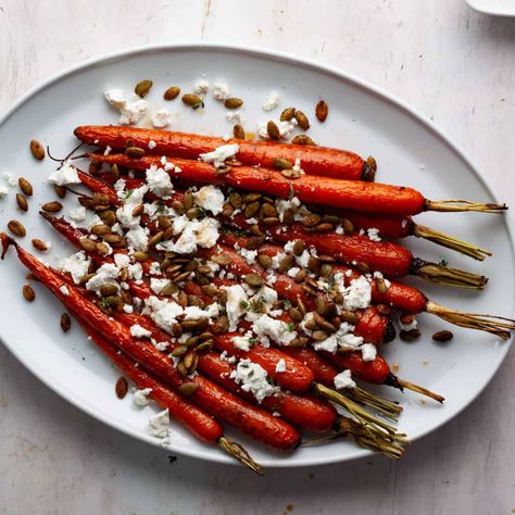 Maple Roasted Carrots with Goat Cheese and Spiced Pepitas - The Real Recipes Maple Goat Cheese Carrots, Roasted Carrots Goat Cheese, Spiced Pepitas, Goat Cheese Carrots, Roasted Carrots With Goat Cheese, Peanut Butter Granola Recipe, Maple Roasted Carrots, Maple Glazed Carrots, Best Meal Prep