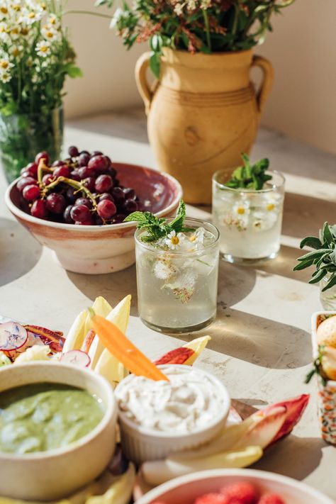 An Elderberry Cocktail is the Spring Sipper Your Next Dinner Party Needs Elderberry Cocktail, Spring Charcuterie Board, Spring Charcuterie, Floral Ice Cubes, Spring Flavors, Vegan Easter Recipes, Best Summer Cocktails, Spring Cocktail, Slow Roasted Tomatoes