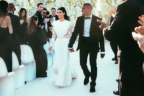 Kim Kardashian and Kanye West For her big (huge!) wedding day with rapper Kanye West, Kim Kardashian wore a Givenchy haute couture gown and ivory satin heels created for the bride by designer Giuseppe Zanotti. Kim Kardashian Wedding Dress, Kimye Wedding, Givenchy Wedding Dress, Kanye West Wedding, Kardashian Wedding, Kim Kardashian Wedding, Estilo Kim Kardashian, Kanye West And Kim, Kim Kardashian Kanye West