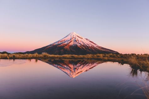 photographer based in auckland, new zealand who shoots landscapes, portraits and events. come take a look at my portfolio Mount Taranaki, Unbelievable Nature, New Zealand Landscape, Scenic Landscape, Landscape Photographers, Science And Nature, Beach Sand, Scenic Views, Clear Water