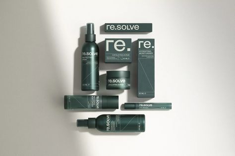 Re.solve is a grooming brand targeted towards the modern man. With a focus on boosting confidence effortlessly, its ‘SKIN.CARE’ range focuses on fixing long-term skin problems whilst its ‘SKIN.WEAR’ products discreetly hide short-term imperfections. When crafting the branding, London-based design agency Two Create Studio delivered on all touch points; from name development, visual identity, tone of voice and packaging design, through to campaign collateral including art direction for stills, fil Mens Skin Care Packaging, Skin Care Branding Design, Cosmetic Shelf, Charcoal Cleanser, Product Render, Boosting Confidence, Cosmetic Packaging Design, Skin Care Packaging, Tone Of Voice