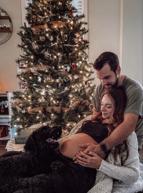 Christmas Maternity Pictures Couple, Christmas Card Photo Ideas Pregnant, Winter Maternity Pictures At Home, Christmas Baby Bump Pictures, Christmas Pictures Pregnant, Christmas Tree Pregnancy Photo, Christmas Tree Maternity Pictures, Pregnant Christmas Pictures, Maternity Photography Christmas