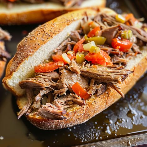 Authentic Italian Beef Sandwich with tender beef, savory spices, and giardiniera. Perfect for a hearty and delicious meal. Cheeseburger Meatloaf Recipes, Italian Beef Sandwich, Hamburger Steak Recipes, Beef Sandwich Recipes, Cheesy Rice, Italian Beef Sandwiches, Beef Sandwiches, Rice Casserole Recipes, Italian Beef