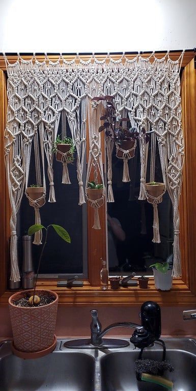 Macrame Plant Hanger Kitchen Window, Macrame Wall Hanging With Plants, Macrame Over Curtain, Kitchen Macrame Curtain, Macrame Curtain Plant Hanger, Macrame Plant Curtain, Creative Plant Hangers, Window Macrame Plant Hanger, Macrame Window Curtain Pattern