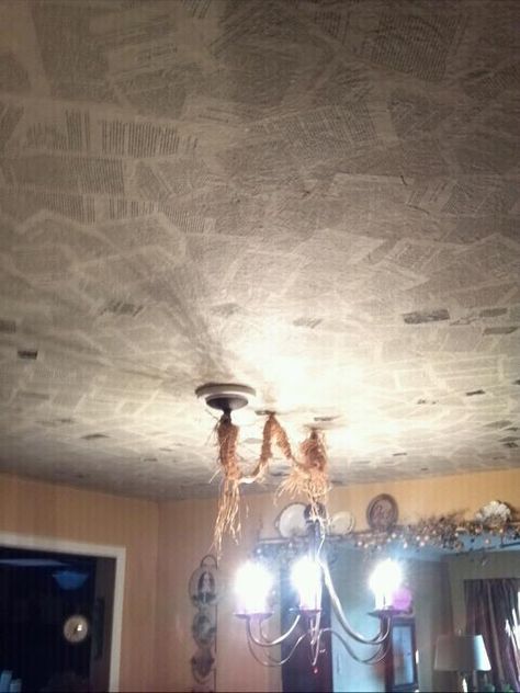 History book pages on dining room ceiling...be careful..it get slippery papering the ceiling :) Book Pages On Ceiling, Casita Office, Dining Room Ceiling, History Book, Room Ceiling, The Ceiling, Be Careful, History Books, Book Crafts