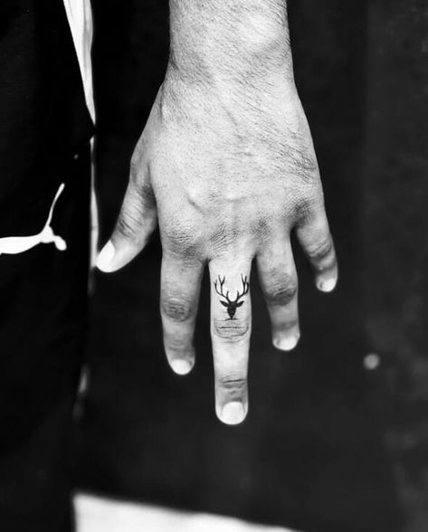 Deer Finger Tattoos For Men Minimalist Tattoo Men Finger, Deer Skull Finger Tattoo, Deer Tattoo On Finger, Tattoo Strength Men, Tattoo For Finger Men, Deer Finger Tattoo, Deer Hand Tattoo, Men Finger Tattoo Ideas, Small Finger Tattoos Men