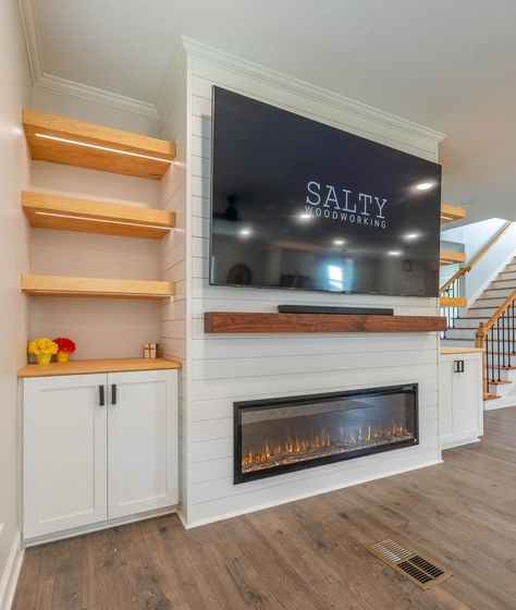 Share your electric fireplace project for #NationalSwapIdeasDay and help someone out in need of inspo! 🤩 Check out @saltywoodworking_ for some brilliant design ideas! #luxuryroom #interiordesign #housegoals #fireplaceideas #livingroomgoals #livingroomideas #interiordesign #electricfireplace #touchstonehomeproducts Building Electric Fireplace Wall, Electric Fireplace And Built Ins, Built In Shelves Living Room Electric Fireplace, Electric Wall Fireplace Ideas, Basement Electric Fireplace Ideas, Electric Fireplace Ideas With Tv Built Ins, Basement Electric Fireplace, Built In Electric Fireplace Ideas, Fireplace With Cabinets