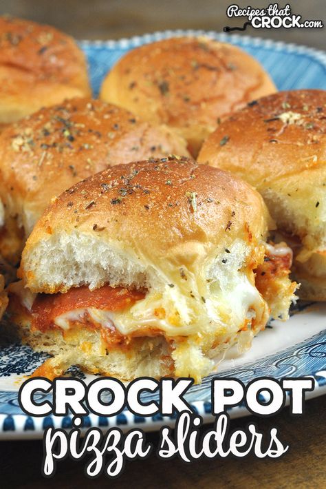 These Crock Pot Pizza Sliders are a crowd favorite! Better yet, they are super easy to throw together and cook quickly. Win win! Easy Dinner Ideas To Feed A Crowd, Sandwiches To Feed A Crowd, Crock Pot Pitch In Recipes, Crowd Pleasing Crockpot Recipes, Easy Recipes For Large Groups, Crock Pot Sliders Recipes, Crock Pot Food For Party, Hot Potluck Dishes Crockpot, Easy Game Day Crockpot Recipes