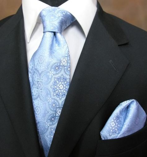 Black suit with baby blue tie-- paisley tie from the tie bar Black Tux With Light Blue Tie, Black Suit Light Blue Tie Wedding, Black Suit Blue Tie Wedding, Black Suit With Blue Accents, Blue Tie With Black Suit, Groomsmen Black Suit Blue Tie, Blue Tie Black Suit, Black Suit Colored Tie, Suit With Light Blue Tie