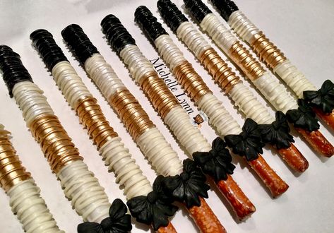 Black And Gold Pretzel Rods, Chocolate Covered Pretzel Sticks, 50th Birthday Cupcakes, Chocolate Pretzel Rods, Pretzel Treats, Graduation Desserts, Sweet Buffet, Mini Dessert Cups, Chocolate Covered Pretzel Rods