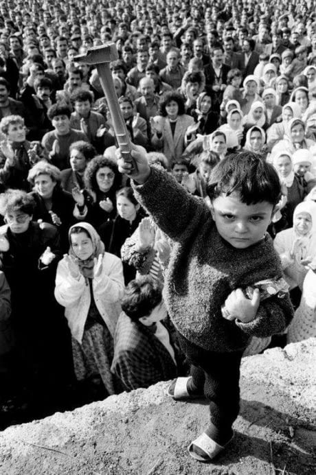 A young Turkish boy raises up a hammer during a solidarity rally for the 42000 miners on strike in  Zonguldak coal fields, November 1990. Coal Miners, Art Brut, Foto Art, Documentary Photography, Bw Photo, White Photo, Photojournalism, Historical Photos, Vintage Photography