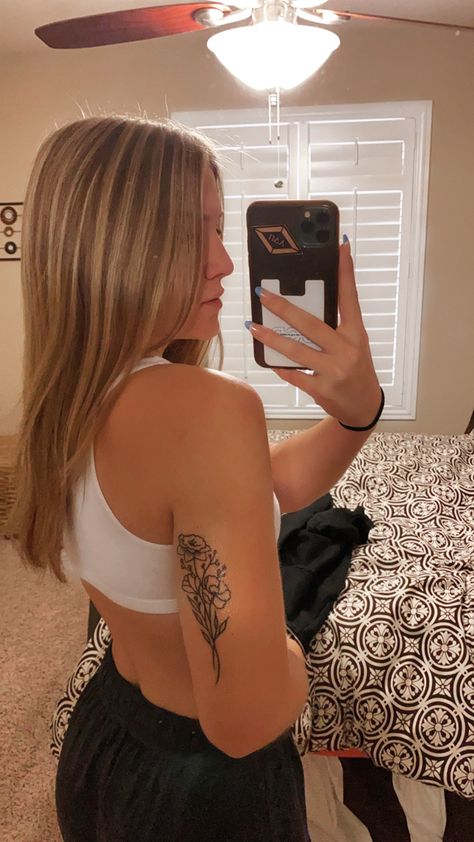 Cute Inner Arm Tattoos, Back Bicep Tattoos For Women, Flower Tattoo On Back Of Arm, Floral Tattoo Placement For Women, Flower Back Of Arm Tattoo, Tattoos On The Back Of The Arm, Back Of Upper Arm Tattoo Women, Upper Arm Flower Tattoos For Women, Maiden Name Tattoos For Women