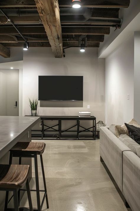 Creative Small Basement Ideas for Low Ceilings Basement Exposed Ceiling Ideas, White Exposed Basement Ceiling, Black Sprayed Ceiling Basement, Basement Ceiling Painted Black, Low Ceiling Basement Ideas, Low Basement Ceiling, Black Basement Ceiling, Small Finished Basement Ideas, Ideas For Low Ceilings