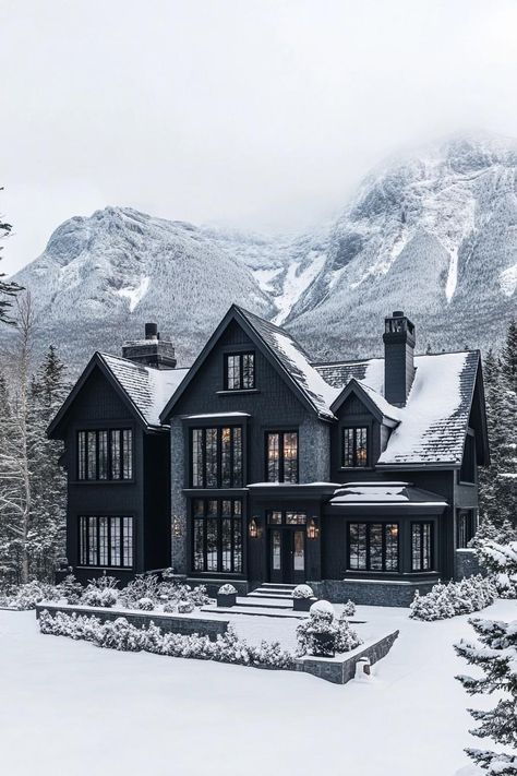 High angle view of large black manor house modern windows roof with gables and black shingles winter wonderland landscape with majestic snowy. Roam the grand halls of manor houses, where century-old secrets meet architectural splendor, offering you a taste of noble living without the need to perfect your curtsy. Black Shingles, Black Manor, Small Rustic Cabin, Wonderland Landscape, Sims 4 Loft, Snowy House, Black Houses, Stone Chimney, Stone Facade