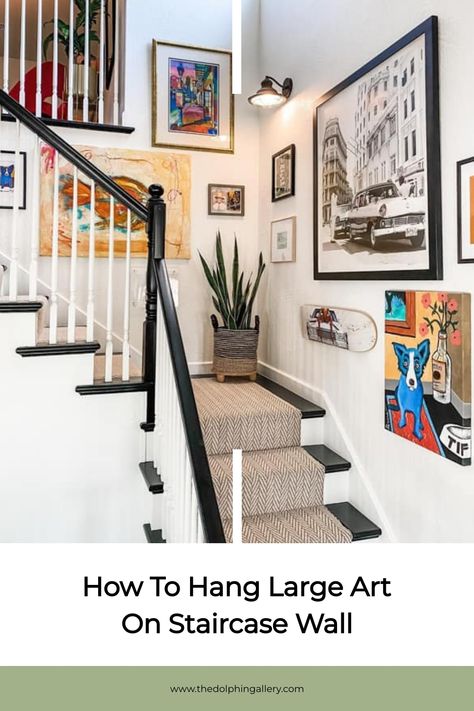 Create a stunning staircase wall with large art by following these expert tips—discover the secrets to achieving perfect placement! Large Art Staircase, Picture Collage Wall Staircase, Art For Stairway Wall, Art On Staircase Wall, Stairway Artwork, Pictures On Staircase Wall, Staircase Feature Wall, Picture Wall Staircase, Pictures On Stairs