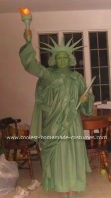 Homemade Statue of Liberty Costume: I researched online what exactly she looked like, so that the Statue of Liberty costume would be completely accurate.   I found this unique fabric, that Statue Of Liberty Torch Diy, Diy Statue Of Liberty Costume, Lady Liberty Costume, Statue Of Liberty Costume, 2015 Halloween Costumes, Haunted Woods, Around The World Theme, School Costume, Fantasy Fest