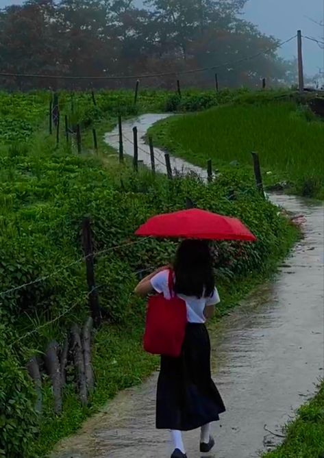 Schoolgirl in white blouse and long maxi skirt holding a red tote bag and matching red umbrella walking on a path in the countryside surrounded by green trees and nature Asia Nature, Japan Countryside, Photography Japanese, Japan Village, Cottagecore Life, Cottagecore Nature, Nature Rain, Japanese Countryside, Japanese Village