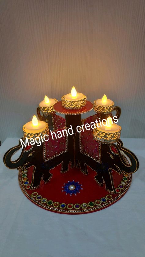 Home decore Elephant Diya stand which is given a elegant look. Diya Stand For Diwali, Diya Holder, Diwali Painting, Diya Stand, Diwali Decor, Pillow Crafts, Magic Hands, Diwali Decorations, U Can